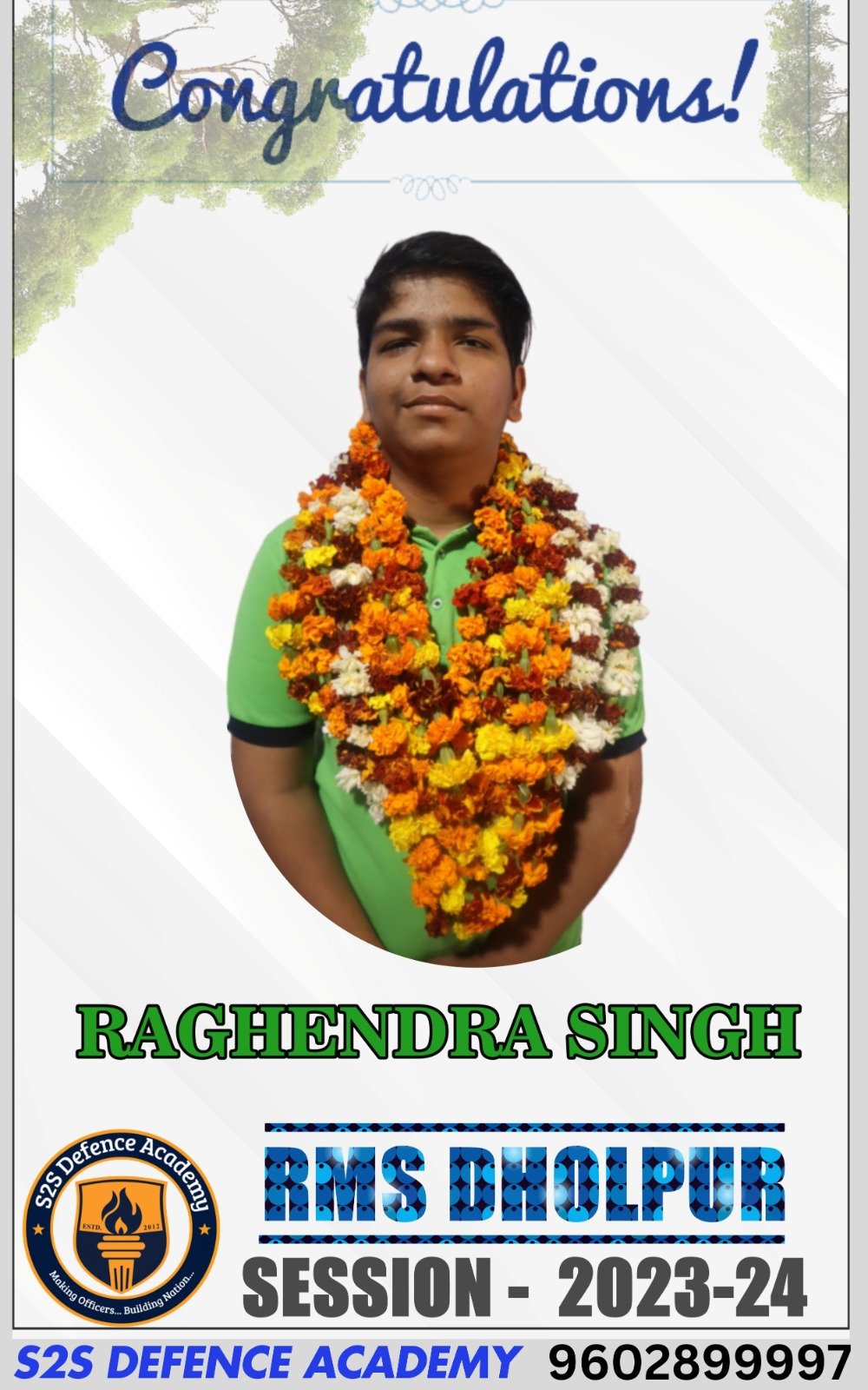 The image shows a congratulatory poster featuring a young boy named "raghendra singh" adorned with garlands of marigold and other flowers. The background is light with tree branches on the top edges. A message at the top reads "Congratulations!" in a decorative font. At the bottom, it says "RAGHENDRA SINGH" in large green text, followed by "RMS DHOLPUR" in bold blue, and "SESSION - 2023-24." A circular emblem on the lower left corner shows the "S2S Defence Academy" logo with the slogan "Making Officers... Building Nation."